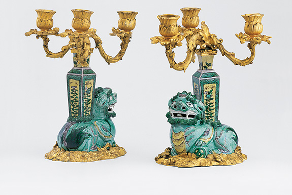 Picture: Pair of Chinese lions with vases on their backs